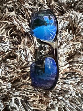 Oakley Men's Black Frame Sunglasses with Blue Mirrored Lenses